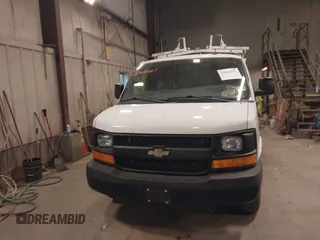 2015 Chevrolet Express Cargo Van with VIN 1GCWGFCF9F1167677, listed as a IAAI auction lot 42018087 with 148,263 mi miles. Bid and sale history available at carsss.com. Image 6.