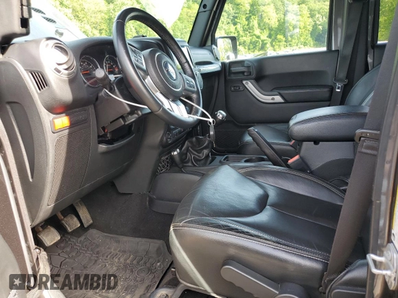 2016 Jeep Wrangler Unlimited Rubicon with VIN 1C4BJWFG4GL252209, listed as a Copart auction lot 58525725 with 46,604 mi miles and Salvage title. Bid and sale history available at DreamBid. Image 7.