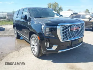 2023 GMC Yukon Denali with VIN 1GKS1DKL2PR301836, listed as a IAAI auction lot 41696192 with 76,940 mi miles. Bid and sale history available at carsss.com. Image 1.