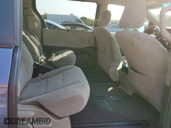 2016 Toyota Sienna LE with VIN 5TDJK3DC2GS133323, listed as a Copart auction lot 70515664 with 106,750 mi miles and Salvage Title. Bid and sale history available at carsss.com. Image 11.