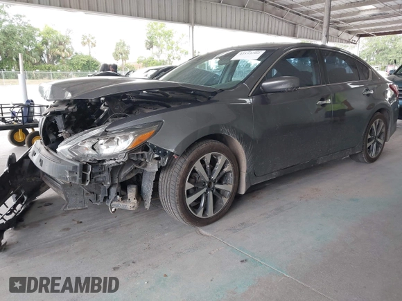 2017 Nissan Altima SL z VIN 1N4AL3AP7HC492566, wystawiony jako IAAI lot #42193702 z przebiegiem 165 566 mil mil oraz . Historia ofert i sprzedaży dostępna na DreamBid. Obrazek 17.