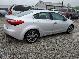 2016 Kia Forte EX z VIN KNAFZ4A87G5550317, wystawiony jako Copart lot #52009755 z przebiegiem 107 404 mil mil oraz Nie do naprawy • Non repairable. Historia ofert i sprzedaży dostępna na DreamBid. Obrazek 3.