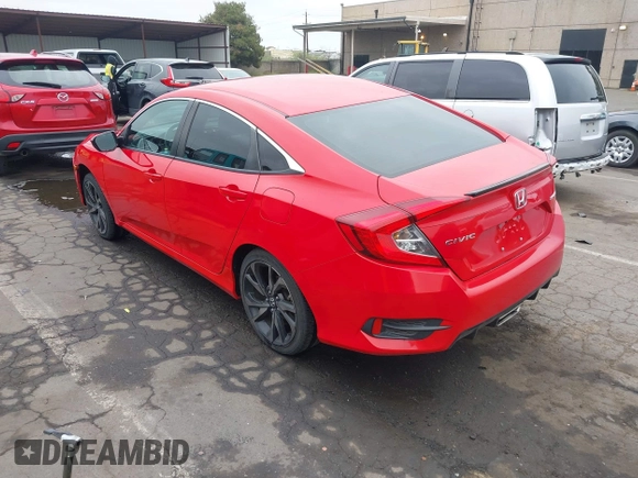 2019 Honda Civic Sport with VIN 2HGFC2F80KH538093, listed as a IAAI auction lot 42093863 with 63,349 mi miles and . Bid and sale history available at DreamBid. Image 3.