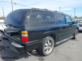 2004 GMC Yukon XL Denali with VIN 1GKFK66U34J125239, listed as a IAAI auction lot 40566893 with 1 mi miles. Bid and sale history available at carsss.com. Image 4.
