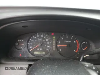 2000 Nissan Frontier XE with VIN 1N6DD26SXYC400648, listed as a Copart auction lot 58756855 with 148,051 mi miles and Salvage title. Bid and sale history available at DreamBid. Image 9.