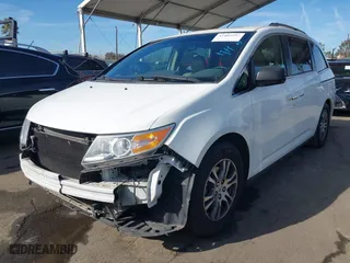 2011 Honda Odyssey EX-L with VIN 5FNRL5H67BB007777, listed as a IAAI auction lot 41402903 with 210,921 mi miles. Bid and sale history available at carsss.com. Image 18.