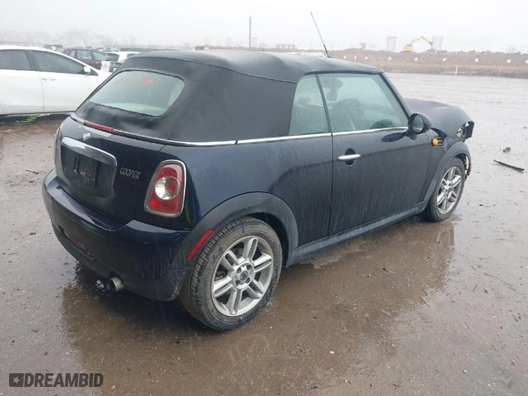 2013 MINI Cooper Convertible with VIN WMWZN3C53DT135492, listed as a IAAI auction lot 41436703 with 79,408 mi miles. Bid and sale history available at carsss.com. Image 4.