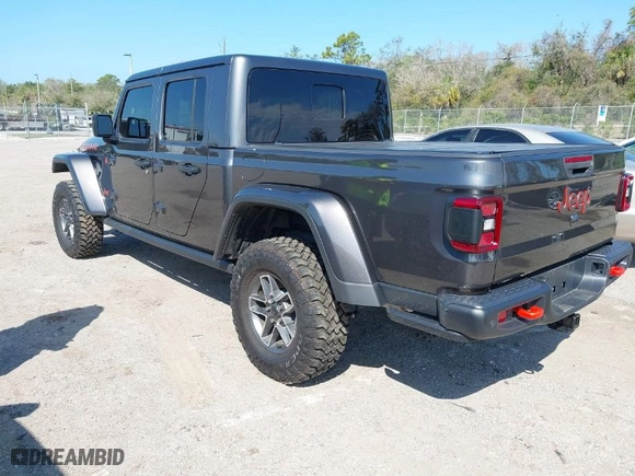 2024 Jeep Gladiator Mojave X with VIN 1C6JJTEGXRL123199, listed as a IAAI auction lot 41683087 with 7,326 mi miles. Bid and sale history available at carsss.com. Image 3.