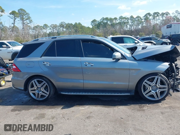 2013 Mercedes-Benz M ML 63 AMG with VIN 4JGDA7EB9DA155725, listed as a IAAI auction lot 41502675 with 64,849 mi miles. Bid and sale history available at carsss.com. Image 12.
