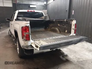 2018 GMC Sierra 1500 SLE z VIN 3GTU2MEC5JG104843, wystawiony jako IAAI lot #42447744 z przebiegiem 136 874 mil mil oraz . Historia ofert i sprzedaży dostępna na DreamBid. Obrazek 3.