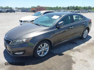 2012 Kia Optima EX with VIN 5XXGN4A6XCG024867, listed as a IAAI auction lot 42079549 with 119,563 mi miles and . Bid and sale history available at carsss.com. Image 2.