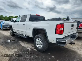 2018 GMC Sierra 2500HD SLT with VIN 1GT12TEG4JF202330, listed as a Copart auction lot 62895355 with 87,049 mi miles and Salvage title. Bid and sale history available at DreamBid. Image 2.