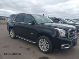 2016 GMC Yukon SLT with VIN 1GKS2BKC7GR249573, listed as a IAAI auction lot 41697488 with 140,658 mi miles. Bid and sale history available at carsss.com. Image 1.