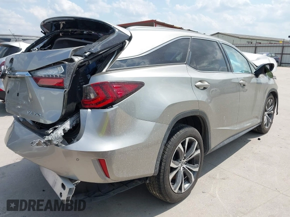 2019 Lexus RX 350L Premium with VIN JTJGZKCA5K2012847, listed as a IAAI auction lot 42331497 with 100,945 mi miles and . Bid and sale history available at DreamBid. Image 4.