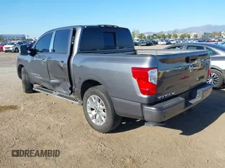 2020 Nissan Titan Platinum Reserve with VIN 1N6AA1EF8LN512582, listed as a IAAI auction lot 42236611 with 18,375 mi miles and . Bid and sale history available at DreamBid. Image 3.