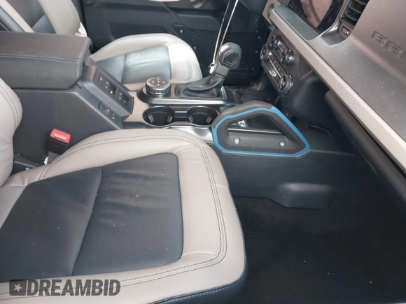 2024 Ford Bronco Wildtrak with VIN 1FMEE2BP1RLA75293, listed as a IAAI auction lot 42199529 with 6,466 mi miles and . Bid and sale history available at DreamBid. Image 5.
