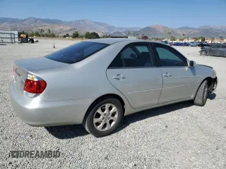 2006 Toyota Camry LE z VIN 4T1BF32K46U113289, wystawiony jako Copart lot #52558135 z przebiegiem 213 000 mil mil oraz Szkoda całkowita • Salvage title. Historia ofert i sprzedaży dostępna na DreamBid. Obrazek 3.