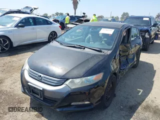 2010 Honda Insight LX with VIN JHMZE2H50AS014165, listed as a IAAI auction lot 42381535 with 169,032 mi miles and . Bid and sale history available at DreamBid. Image 2.