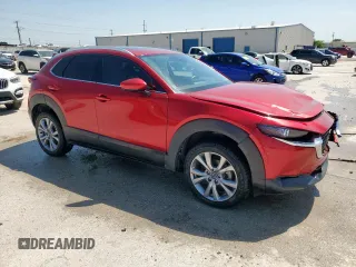 2021 Mazda CX-30 Premium with VIN 3MVDMBDL1MM314747, listed as a Copart auction lot 56669495 with 26,052 mi miles and Salvage title. Bid and sale history available at DreamBid. Image 4.