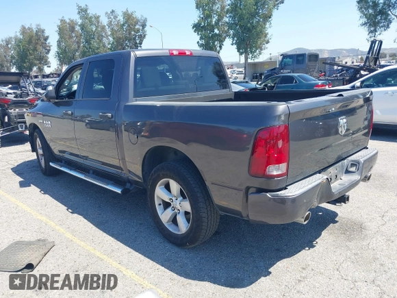 2014 Ram 1500 Express with VIN 1C6RR6KTXES333106, listed as a IAAI auction lot 42220459 with 171,699 mi miles and . Bid and sale history available at DreamBid. Image 3.