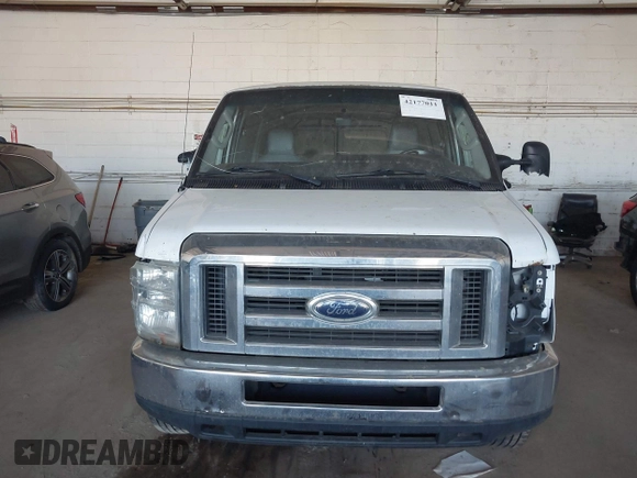2011 Ford Econoline Cargo Commercial with VIN 1FTNE2EW6BDB06514, listed as a IAAI auction lot 42177011 with 336,946 mi miles. Bid and sale history available at carsss.com. Image 12.