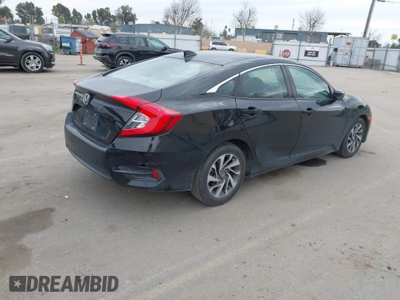 2018 Honda Civic EX with VIN 2HGFC2F75JH583892, listed as a IAAI auction lot 41697605 with 134,675 mi miles and . Bid and sale history available at DreamBid. Image 4.