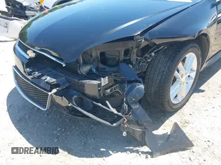 2014 Chevrolet Impala LTZ with VIN 2G1WC5E39E1168726, listed as a IAAI auction lot 42133295 with 146,902 mi miles and . Bid and sale history available at DreamBid. Image 6.
