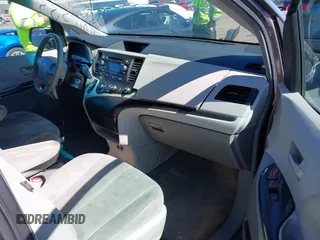 2011 Toyota Sienna with VIN 5TDZK3DC6BS125737, listed as a IAAI auction lot 41815233 with 248,318 mi miles. Bid and sale history available at carsss.com. Image 5.