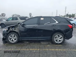 2019 Chevrolet Equinox LT with VIN 2GNAXLEX3K6186898, listed as a IAAI auction lot 41525229 with 77,673 mi miles and . Bid and sale history available at DreamBid. Image 15.