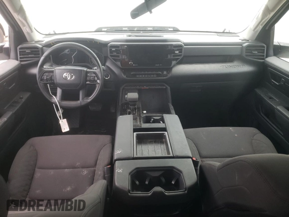 2023 Toyota Tundra SR z VIN 5TFKB5DB2PX073626, wystawiony jako Copart lot #71671243 z przebiegiem 1 188 mil mil oraz . Historia ofert i sprzedaży dostępna na DreamBid. Obrazek 8.