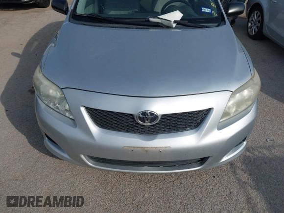 2009 Toyota Corolla with VIN 1NXBU40E19Z027967, listed as a IAAI auction lot 41922518 with 117,115 mi miles. Bid and sale history available at carsss.com. Image 6.