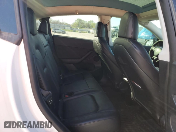 2021 Tesla Model Y Performance with VIN 5YJYGDEF3MF262878, listed as a Copart auction lot 52897595 with 50,939 mi miles and Salvage Title. Bid and sale history available at DreamBid. Image 11.