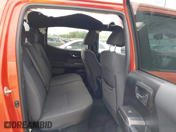 2018 Toyota Tacoma SR5 z VIN 3TMAZ5CN2JM076140, wystawiony jako IAAI lot #41913486 z przebiegiem 142 212 mil mil oraz . Historia ofert i sprzedaży dostępna na DreamBid. Obrazek 8.