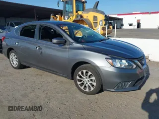 2019 Nissan Sentra S z VIN 3N1AB7AP0KY283319, wystawiony jako IAAI lot #42180378 z przebiegiem 110 867 mil mil oraz . Historia ofert i sprzedaży dostępna na DreamBid. Obrazek 1.