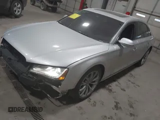 2011 Audi A8 with VIN WAURVAFD5BN014214, listed as a IAAI auction lot 41396044 with 131,764 mi miles and . Bid and sale history available at DreamBid. Image 18.