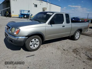2000 Nissan Frontier XE z VIN 1N6DD26S7YC430643, wystawiony jako Copart lot #59386765 z przebiegiem 204 851 mil mil oraz Szkoda całkowita • Salvage title. Historia ofert i sprzedaży dostępna na DreamBid. Obrazek 1.