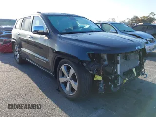 2014 Jeep Grand Cherokee Overland with VIN 1C4RJFCT5EC221015, listed as a IAAI auction lot 41959844 with 78,367 mi miles and . Bid and sale history available at DreamBid. Image 1.