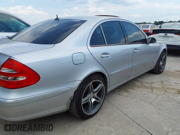 2003 Mercedes-Benz E-Class 3.2L with VIN WDBUF65J23A200332, listed as a IAAI auction lot 42046189 with 269,668 mi miles. Bid and sale history available at carsss.com. Image 6.