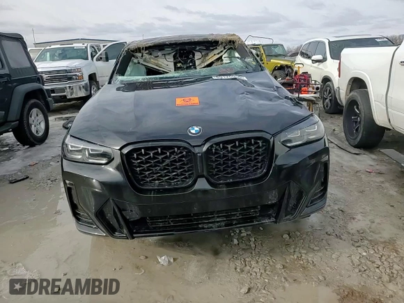2024 BMW X4 xDrive30i z VIN 5UX33DT02R9U91458, wystawiony jako Copart lot #89126955 z przebiegiem Nie podano mil oraz Szkoda całkowita • Salvage title. Historia ofert i sprzedaży dostępna na DreamBid. Obrazek 12.