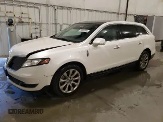 2015 Lincoln MKT EcoBoost with VIN 2LMHJ5AT6FBL02356, listed as a Copart auction lot 79843994 with 138,569 mi miles and Non Repairable. Bid and sale history available at DreamBid. Image 1.