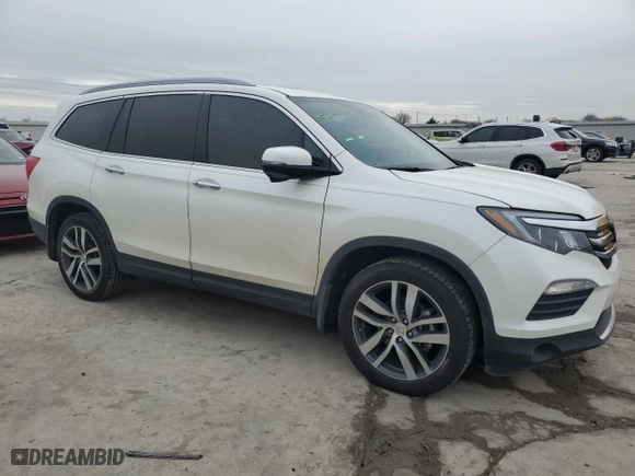 2017 Honda Pilot Touring with VIN 5FNYF5H97HB047668, listed as a Copart auction lot 46139285 with 54,928 mi miles and Salvage Title. Bid and sale history available at carsss.com. Image 4.