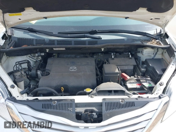 2012 Toyota Sienna XLE with VIN 5TDDK3DC3CS041984, listed as a IAAI auction lot 41711974 with 149,879 mi miles. Bid and sale history available at carsss.com. Image 10.
