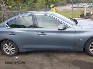 2015 Infiniti Q50 with VIN JN1BV7AR9FM418836, listed as a IAAI auction lot 42181355 with 165,787 mi miles and . Bid and sale history available at DreamBid. Image 14.