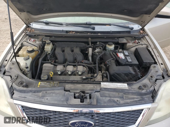 2005 Ford Five Hundred SE with VIN 1FAFP26135G148147, listed as a Copart auction lot 84011184 with 216,546 mi miles and Salvage Title. Bid and sale history available at carsss.com. Image 11.
