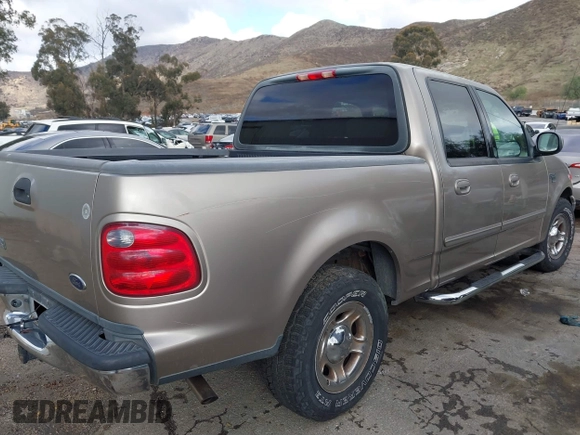 2003 Ford F-150 XLT with VIN 1FTRW07623KD34295, listed as a IAAI auction lot 41515387 with 163,506 mi miles. Bid and sale history available at carsss.com. Image 4.