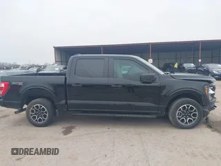 2023 Ford F-150 XL with VIN 1FTEW1C55PKD01184, listed as a IAAI auction lot 41700658 with 18,804 mi miles. Bid and sale history available at carsss.com. Image 13.