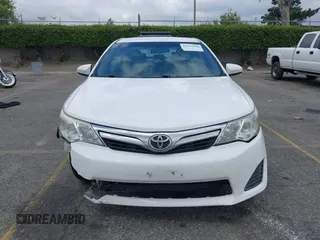 2014 Toyota Camry L with VIN 4T1BF1FK4EU403013, listed as a IAAI auction lot 42115089 with 221,686 mi miles and . Bid and sale history available at DreamBid. Image 12.