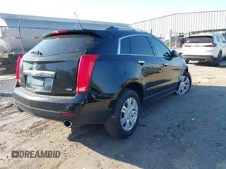 2016 Cadillac SRX Luxury Collection with VIN 3GYFNBE31GS544322, listed as a IAAI auction lot 41855688 with 128,934 mi miles. Bid and sale history available at carsss.com. Image 4.