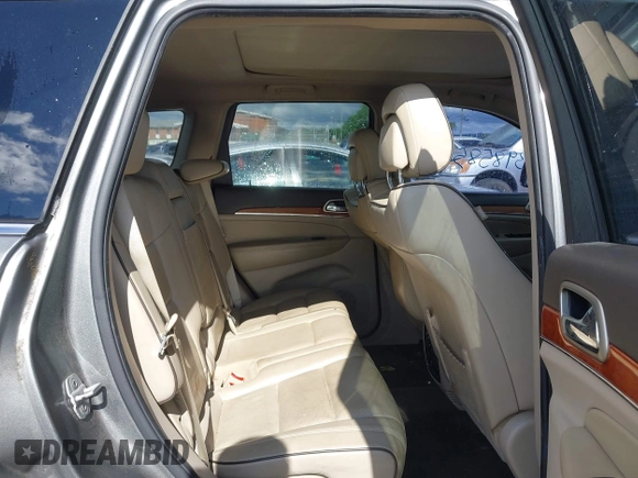 2011 Jeep Grand Cherokee Overland Summit with VIN 1J4RR6GT3BC713812, listed as a IAAI auction lot 42398585 with 208,476 mi miles and . Bid and sale history available at DreamBid. Image 8.