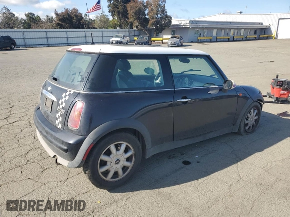 2004 MINI Hardtop with VIN WMWRC33464TJ62893, listed as a Copart auction lot 51905565 with 141,958 mi miles and Salvage Title. Bid and sale history available at DreamBid. Image 3.